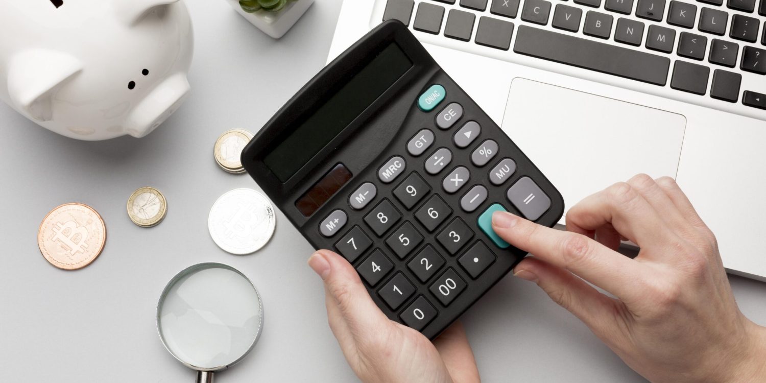 concept-economy-with-piggy-bank-calculator concept-economy-with-piggy-bank-calculator